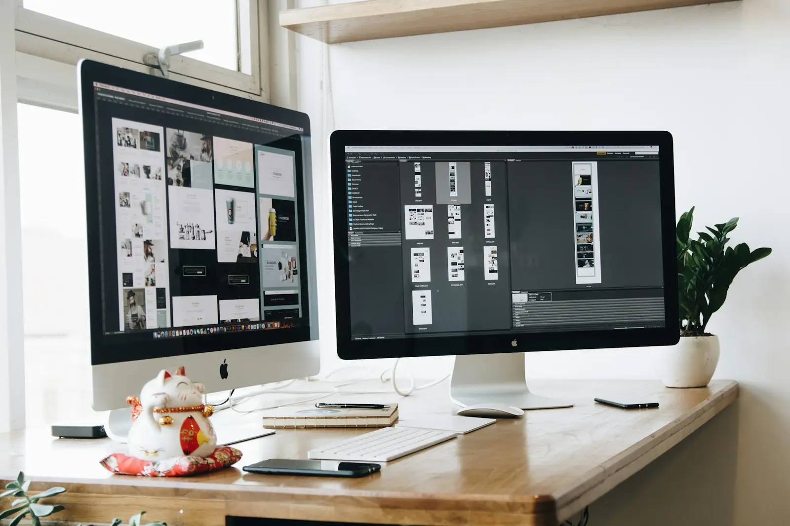 A design workspace with a laptop and notes