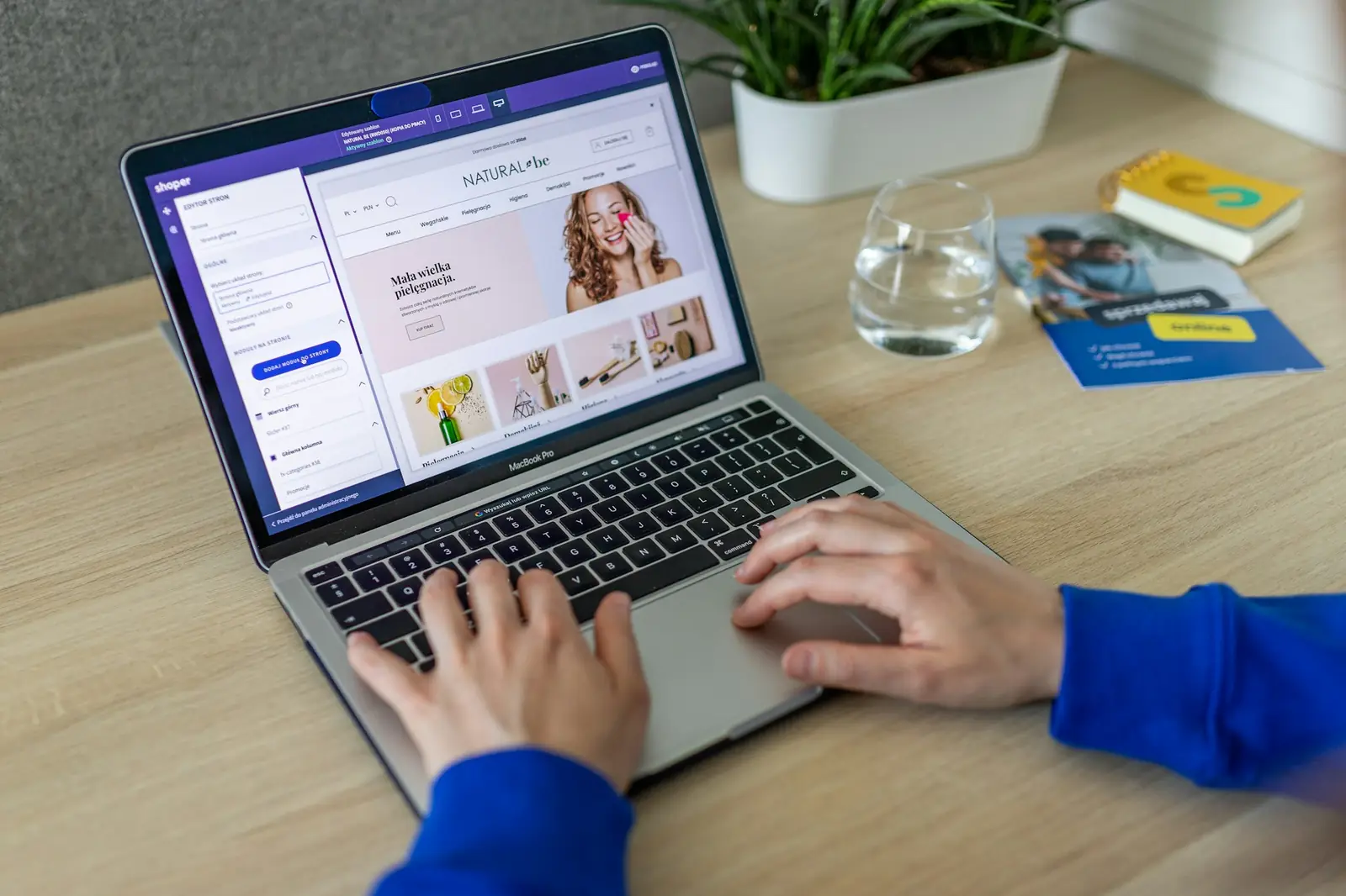 A laptop showing a website design